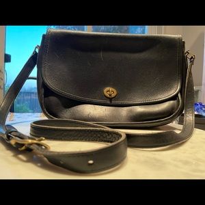Vintage Coach black leather cross body saddle bag.